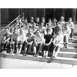 Counselors and staff seated on the front steps of a building, 1957. Ontario Jewish Archives, Blankenstein Family Heritage Centre, fonds 33, series 5, file 7.|